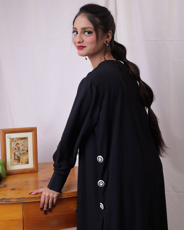 Elegant Black Two-Piece with Statement Side Buttons