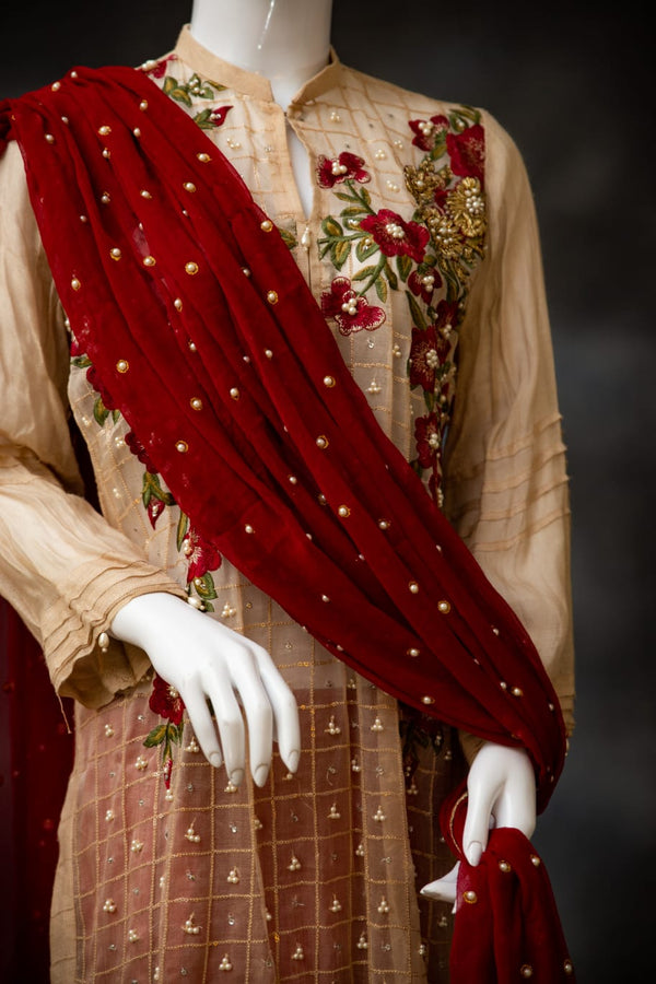 Exquisite Embroidered Beige Suit with Red Dupatta